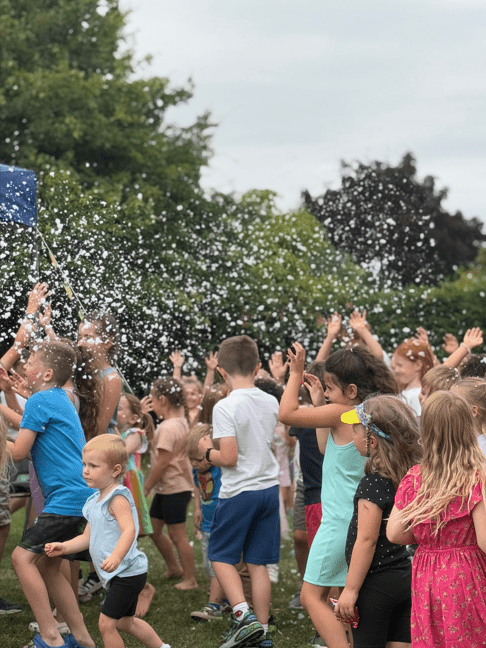 children playing in foam