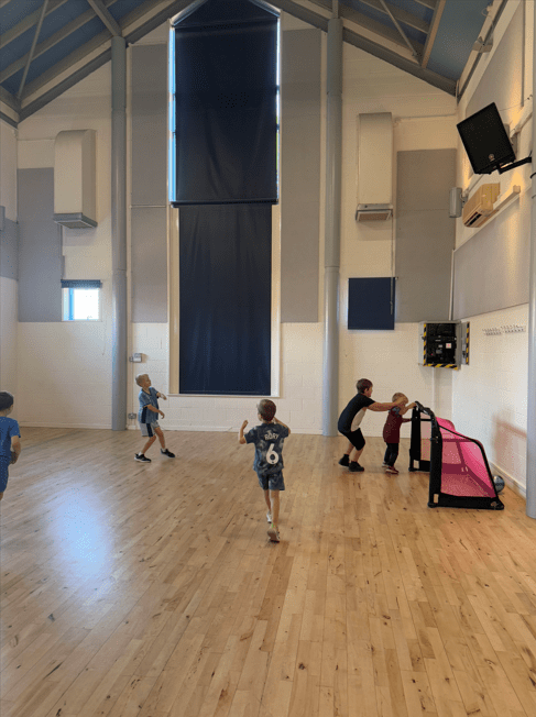 children playing football